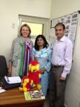 Clare-Hanbury-and-colleagues-in-Pakistan-planning-collaboration-ZZ-and-the-rainbow-stick-helping