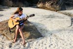 nina with the guitar singing